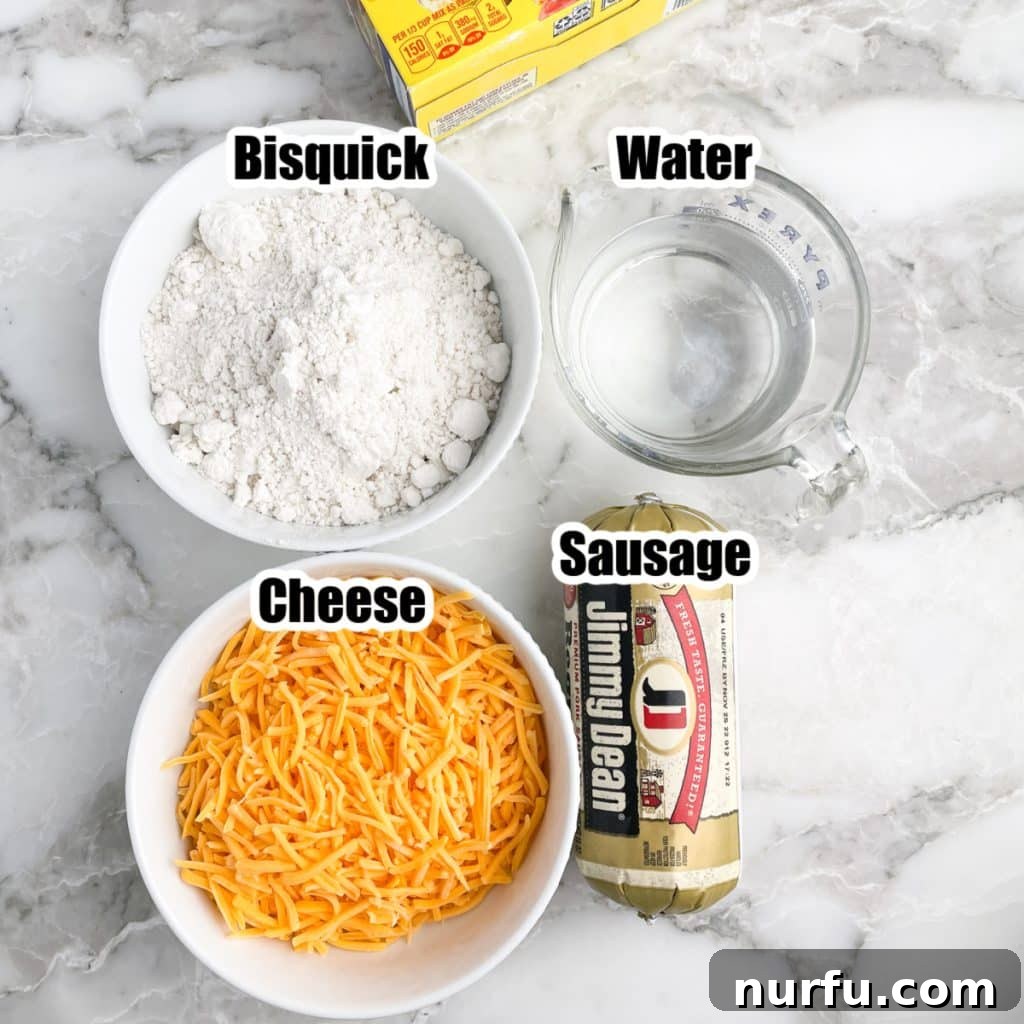 Quick 3 Ingredient Bisquick Sausage Bites 2 Individual ingredients for Bisquick Sausage Balls laid out: a bowl of Bisquick, a bowl of shredded cheese, and a roll of raw breakfast sausage, ready for mixing.