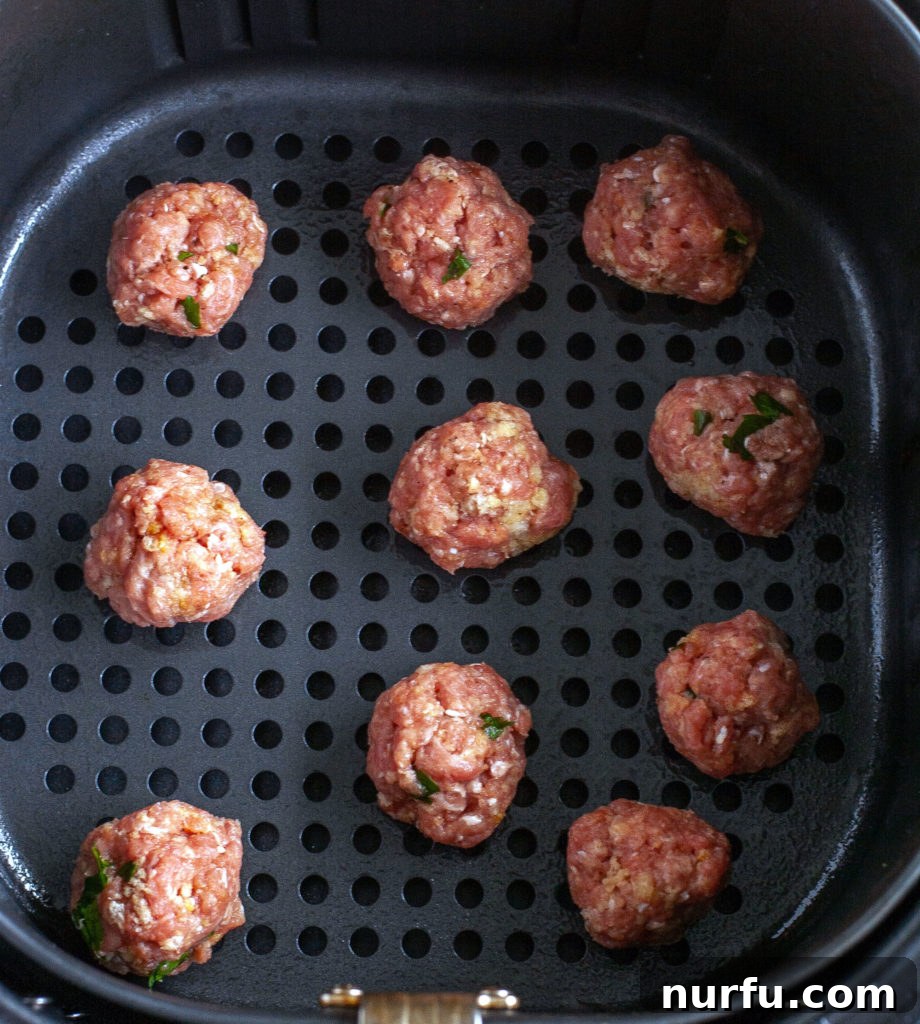 Air fryer turkey meatballs Turkey meatballs in air fryer basket