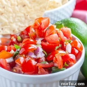 Fresh and Zesty Salsa 6 A bowl of fresh tomatoes, essential for Pico de Gallo.