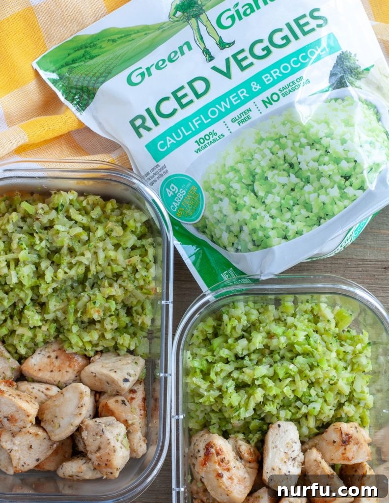 Garlic Butter Chicken Meal Prep Two meal prep bowls filled with Garlic Butter Chicken and riced vegetables, with a bag of Green Giant Riced Veggies in the background, highlighting convenience.