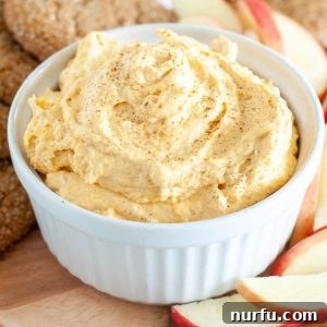 A round, inviting image of a bowl of pumpkin dip, presented beautifully and ready to be served.