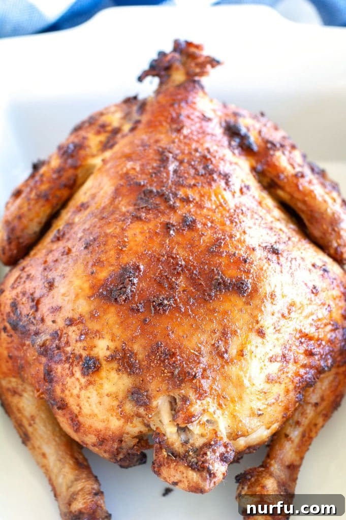 Air Fryer Rotisserie Chicken Rotisserie Chicken in a white dish