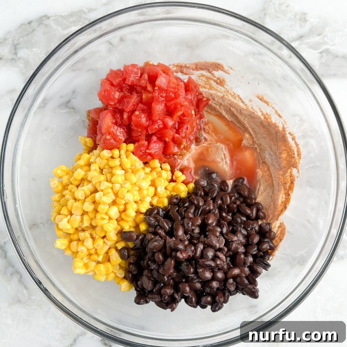Celebration Chicken Bake 4 Bowl with corn, black beans, and diced tomatoes added to the sour cream mixture.