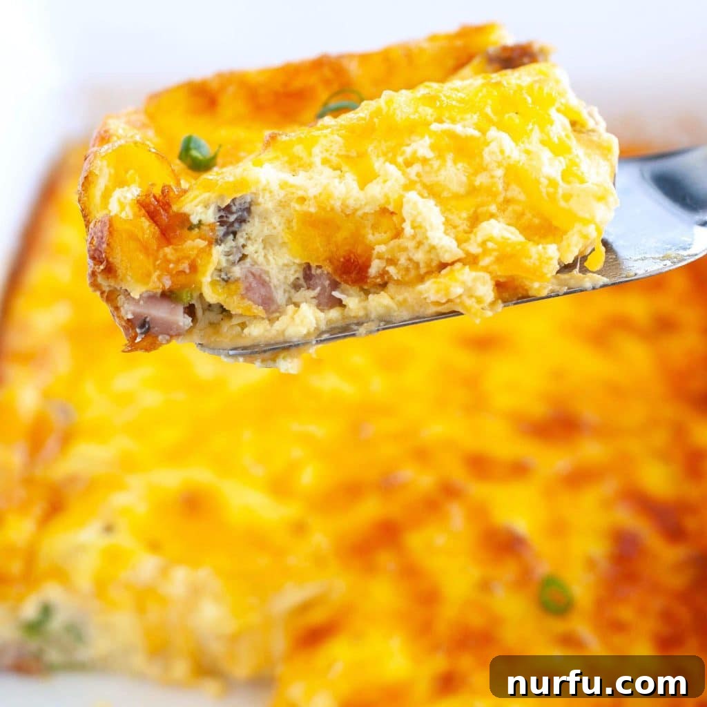 Keto Morning Bake 2 Piece of Keto Breakfast Casserole on a spatula