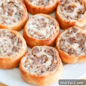 Savory Sausage Spirals 10 Plate of sausage crescent pinwheels.