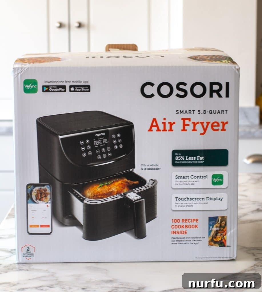 Cosori Air Fryer: Is It Worth Buying 3 The attractive packaging of the Cosori air fryer, hinting at the quality and features within.