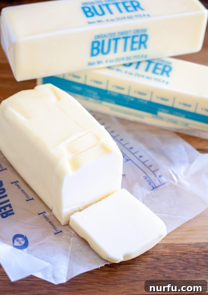 Butter Equivalents: Sticks, Grams, Cups 2 Sliced stick of butter showing measurements
