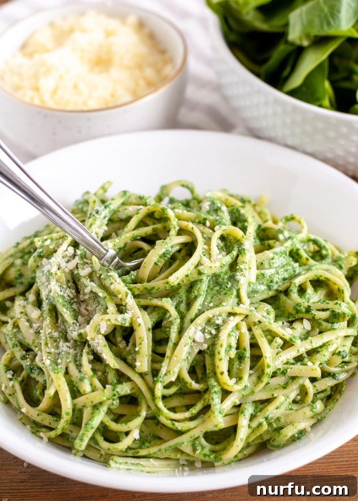 Vibrant Verde Pasta 2 Green Pasta Sauce in a bowl with a fork twirling pasta