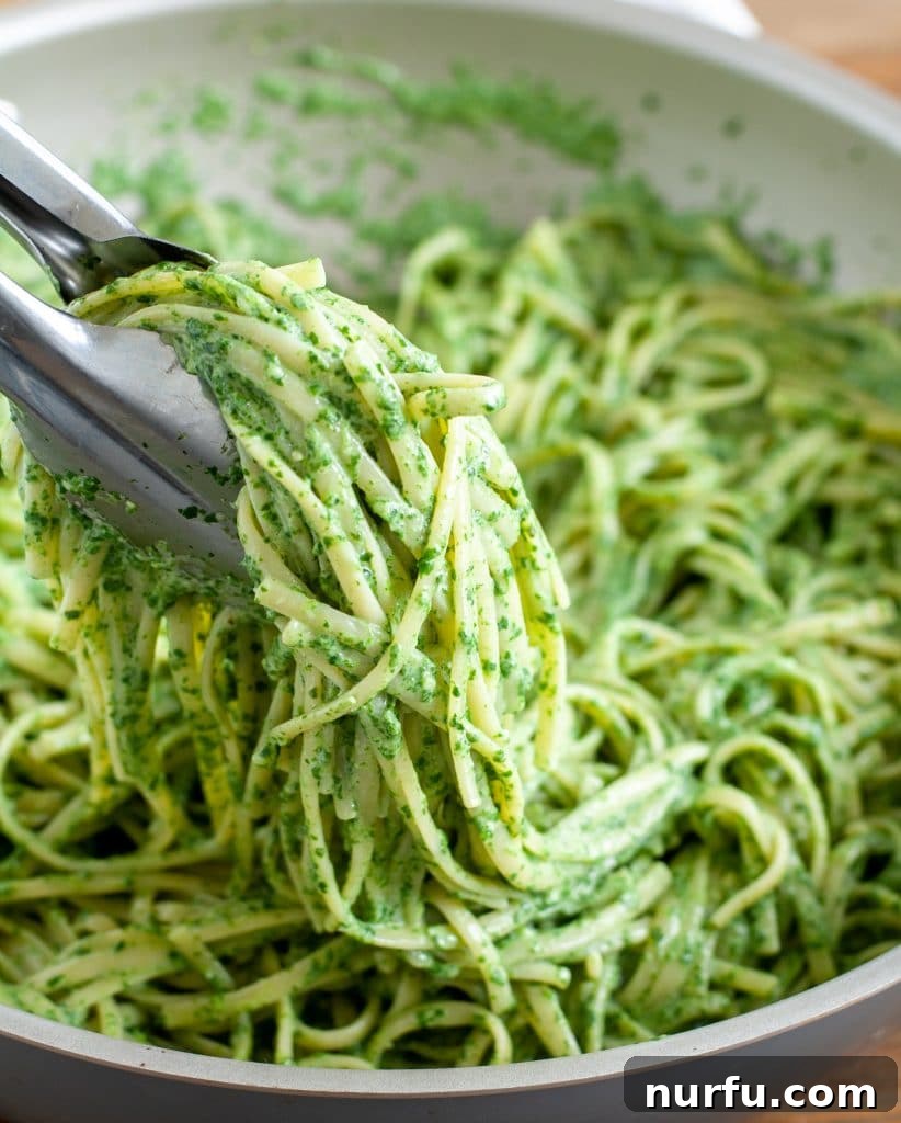 Vibrant Verde Pasta 4 Green pasta being twirled with tongs