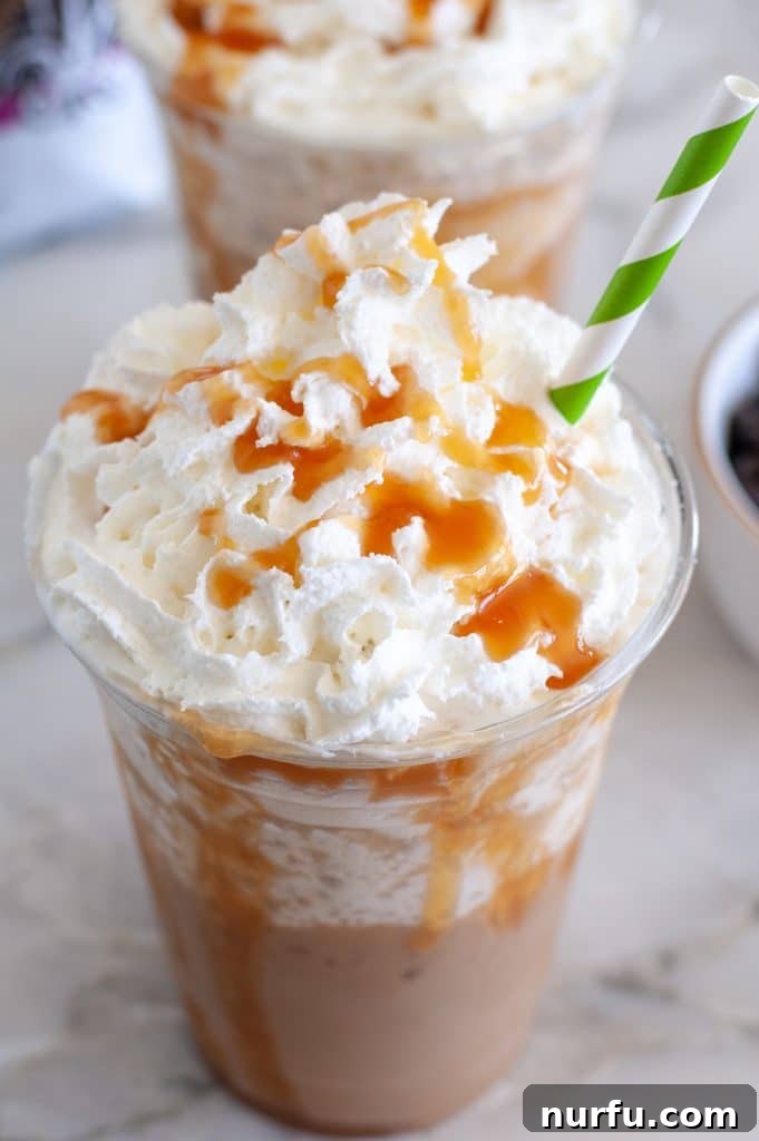 Starbucks Inspired Caramel Frappuccino At Home 2 Frappuccino in a glass with whipped cream and caramel