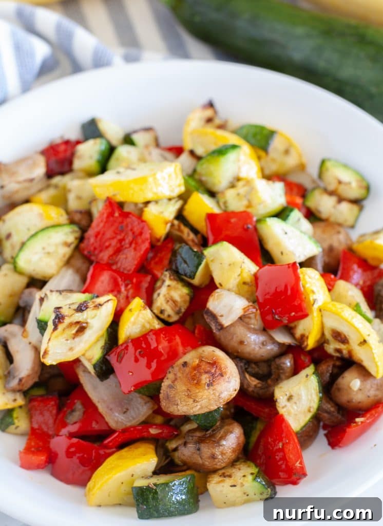 Crispy Air-Fried Veggies 4 A vibrant bowl of colorful, freshly air-fried mixed vegetables, ready to be served.