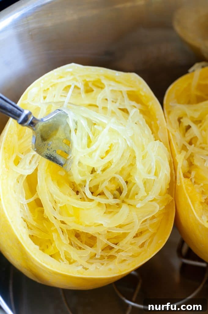 Easy Instant Pot Spaghetti Squash 2 A whole yellow spaghetti squash placed on a trivet inside an Instant Pot, ready for cooking