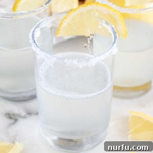 Zesty Lemon Shooters 5 Glass with vodka and lemon.