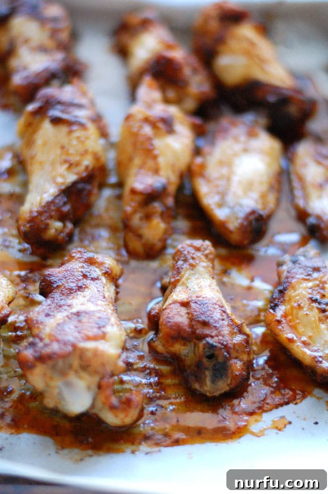 Baked Brown Sugar Chicken Wings Chicken wings on baking sheet