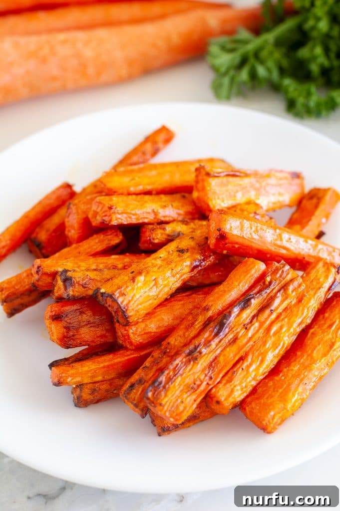 Quick Air Fryer Carrots 2 Roasted carrots on a plate