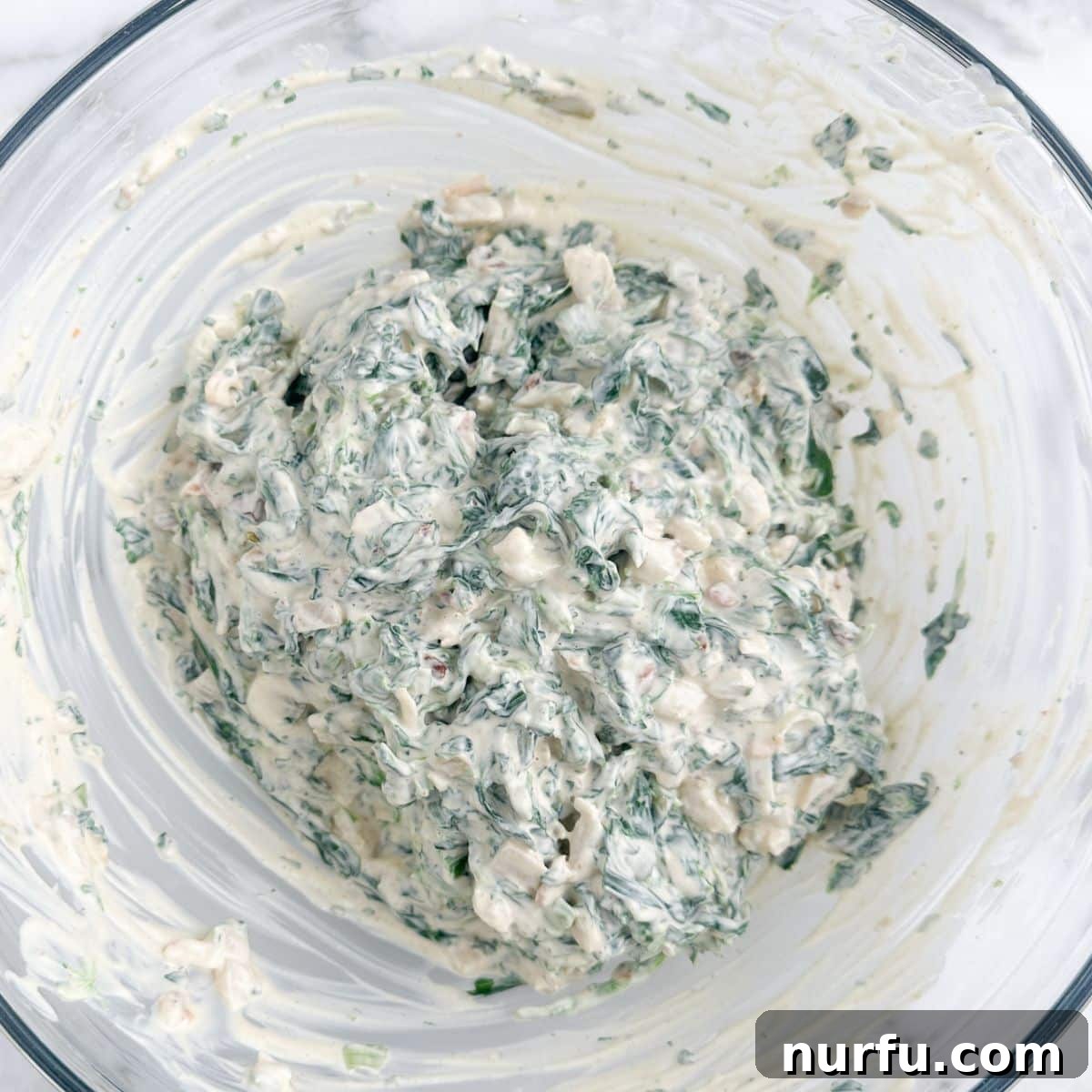Creamy Knorr Spinach Dip 6 Bowl of Knorr spinach dip.