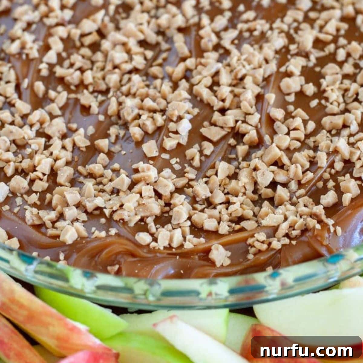 Heavenly Caramel Apple Dip 2 Caramel Apple Dip with Cream Cheese, Caramel, and Toffee Bits served with apple slices
