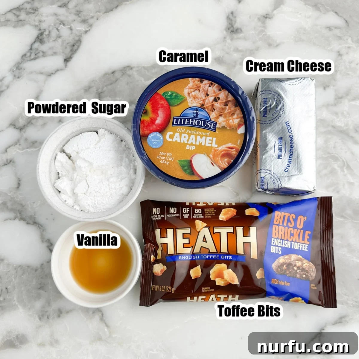 Heavenly Caramel Apple Dip 3 Bowl of powdered sugar, vanilla, cream cheese, caramel dip, and bag of toffee bits, showing the main ingredients for the dip.