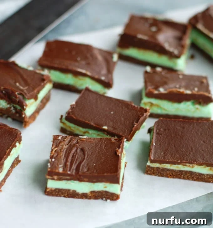 Creme de menthe bars with green sprinkles, perfect for St. Patrick's Day.