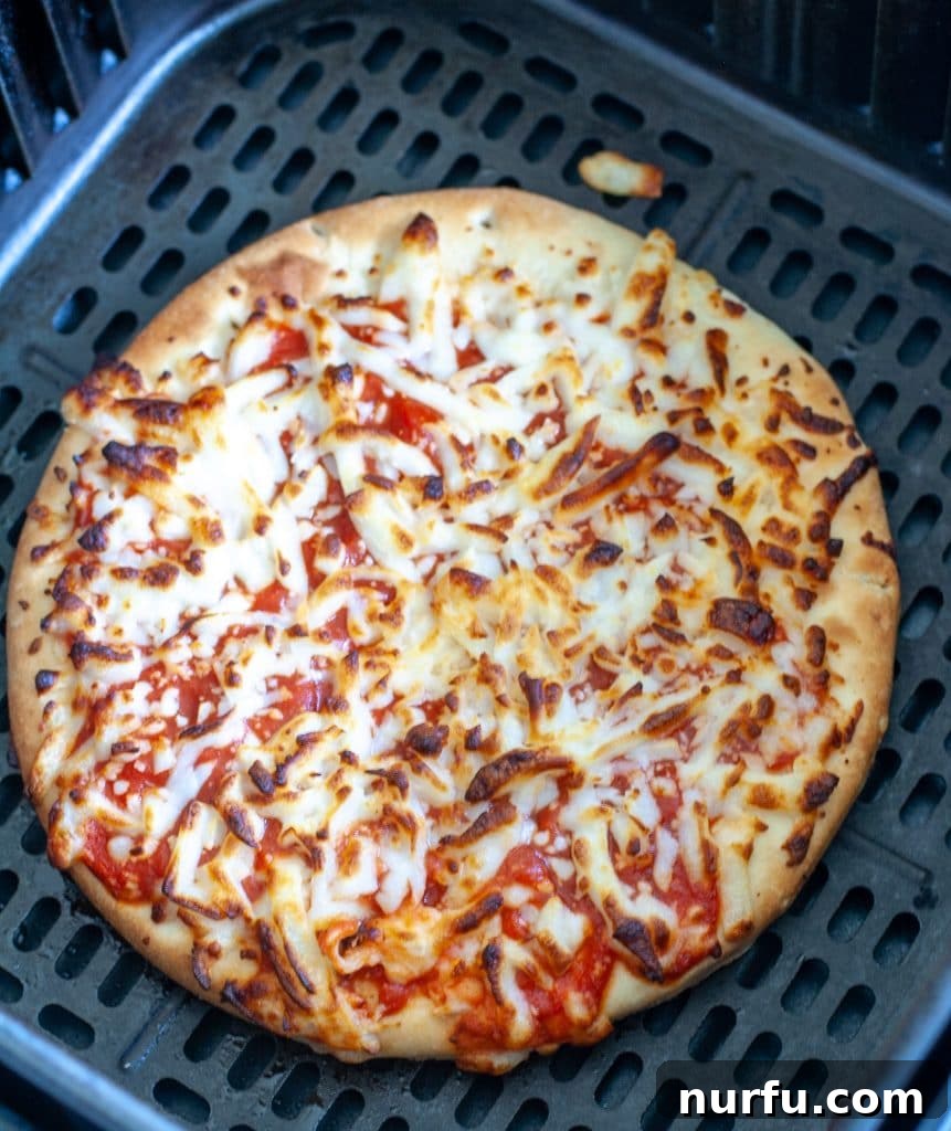 Crispy Air Fryer Frozen Pizza Perfection 2 Cooked frozen pizza