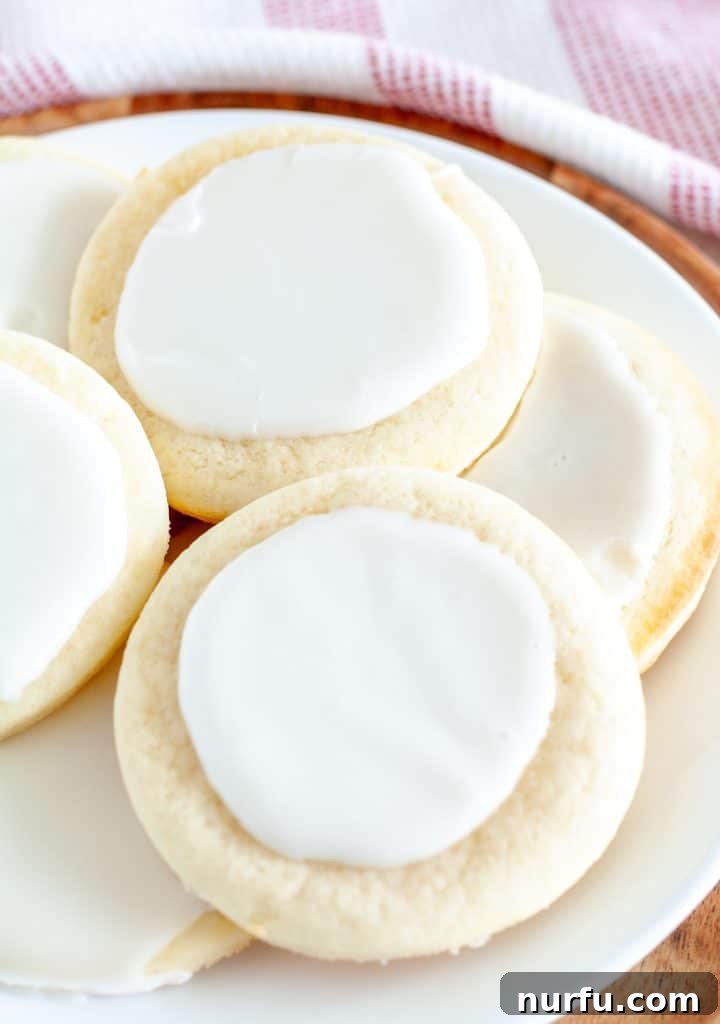 Pillowy Soft Sour Cream Cookies 2 Plate of soft, frosted sour cream cookies