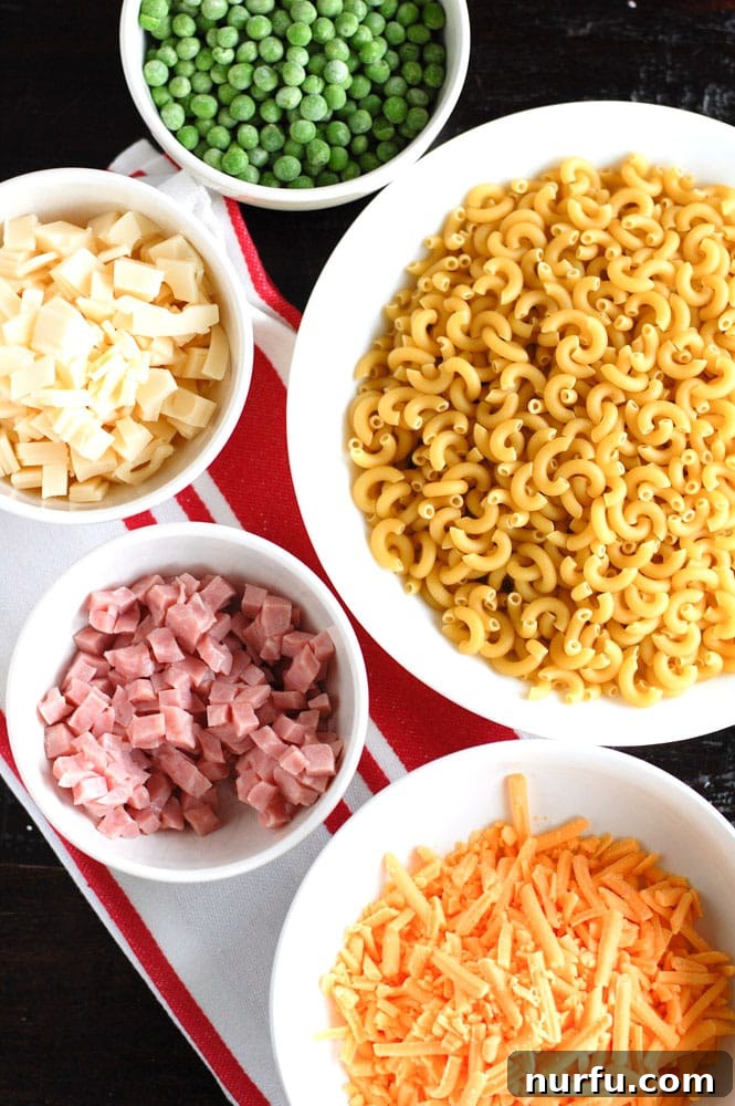 Fresh ingredients for a delectable Macaroni and Cheese with Ham and Peas Ingredients for Macaroni and Cheese with Ham and Peas
