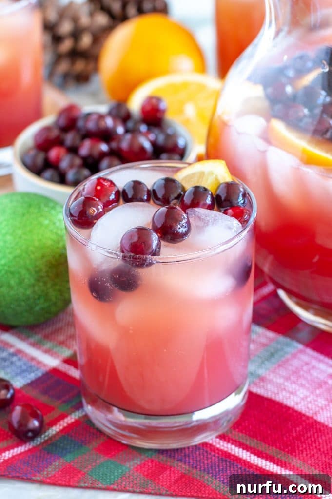 Punch in a glass with cranberries, perfect for Christmas morning