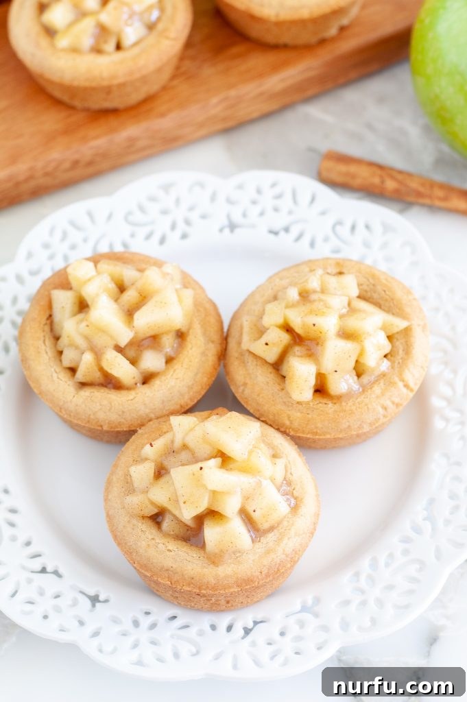 Mini Apple Pie Cookie Treats 4 Apple Pie Cookie Cups displayed beautifully on a plate, ready to be enjoyed