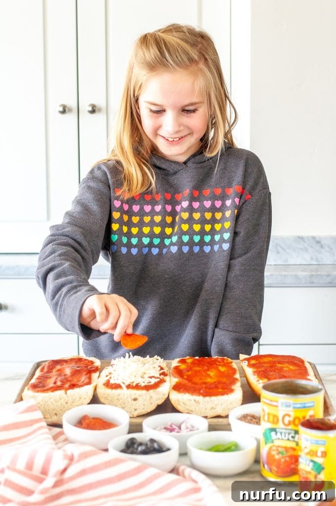 Crispy Baguette Pizza 6 Girl making french bread pizza.