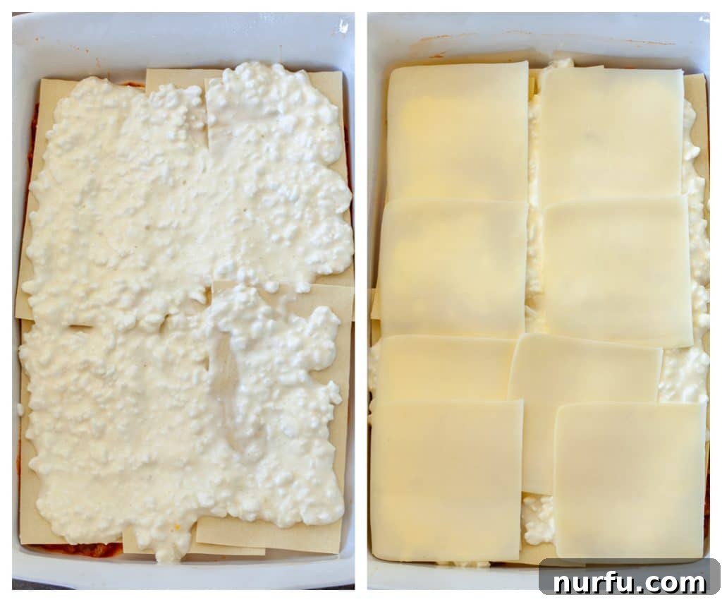 Close-up of a lasagna layer, showing creamy cottage cheese spread over pasta, perfectly topped with glistening slices of mozzarella cheese, ready for the next layer.