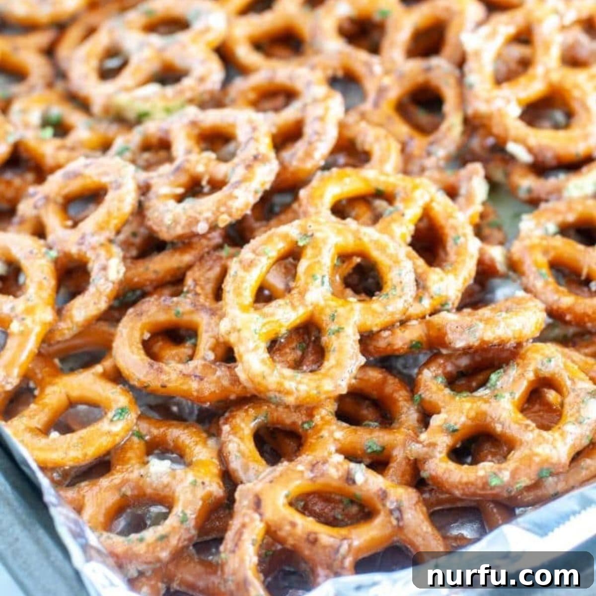 Zesty Ranch Crunchers 3 Crispy ranch pretzels on a sheet pan.