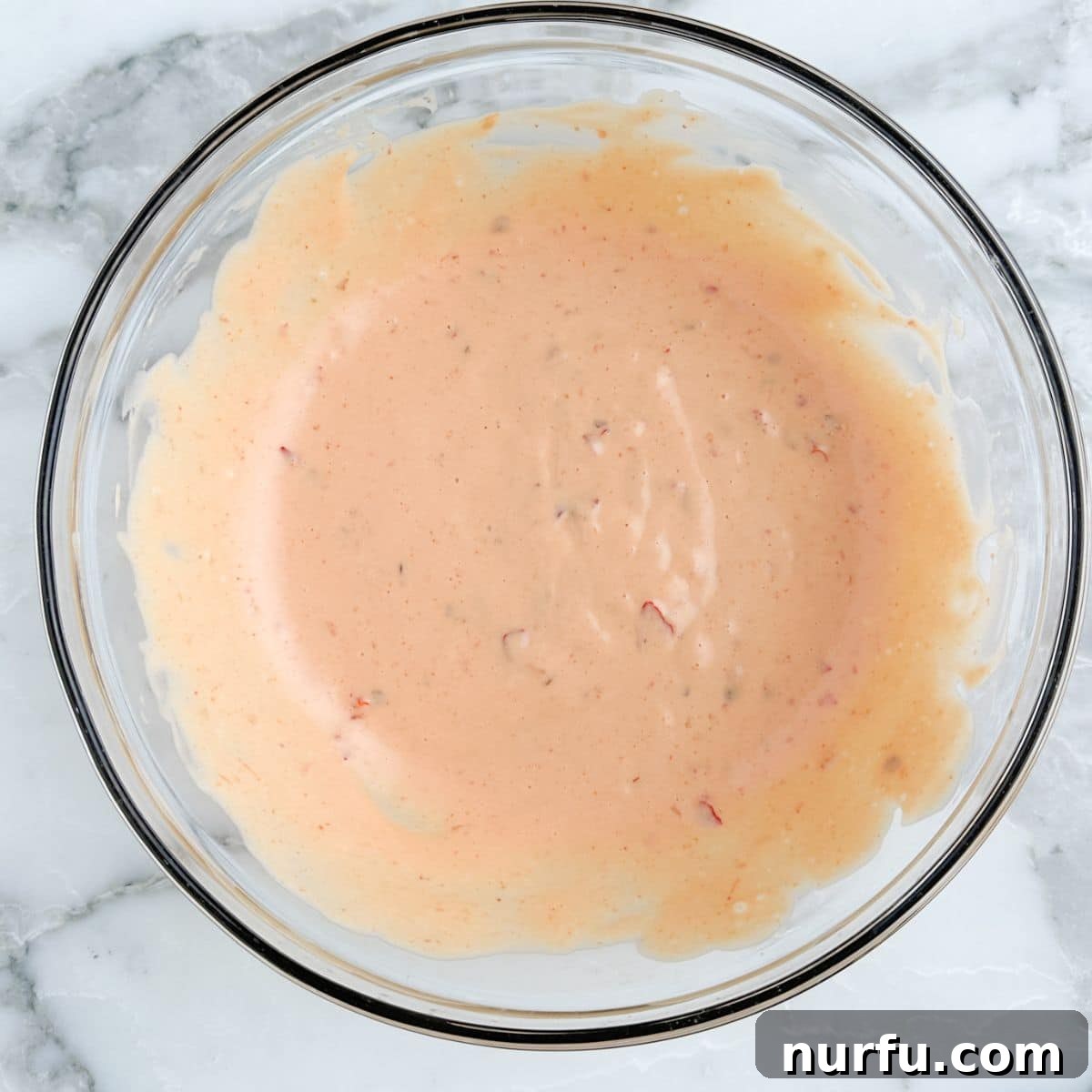 A smooth, perfectly blended bowl of homemade Boom Boom Sauce.