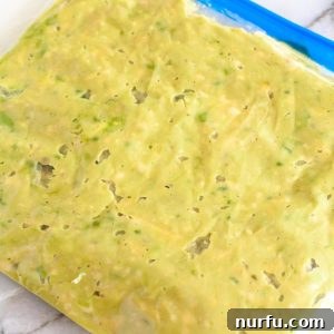 Guacamole in freezer bag, visually representing the finished product ready for freezing.
