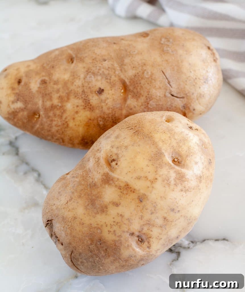 8 Great Mushroom Substitutes 5 Two russet potatoes on table.