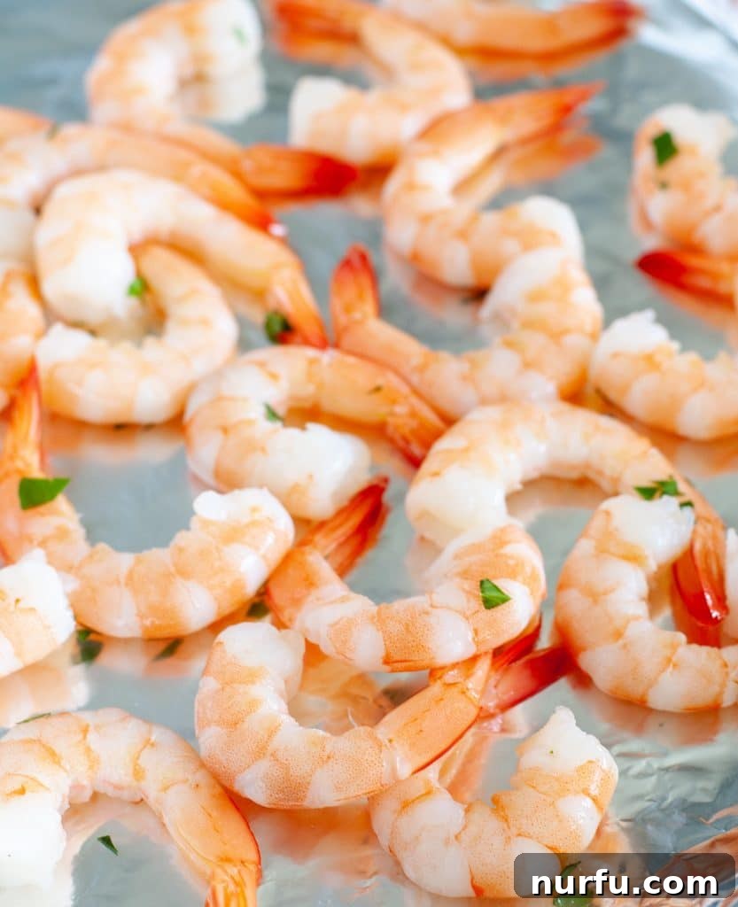Cooked shrimp on foil. 