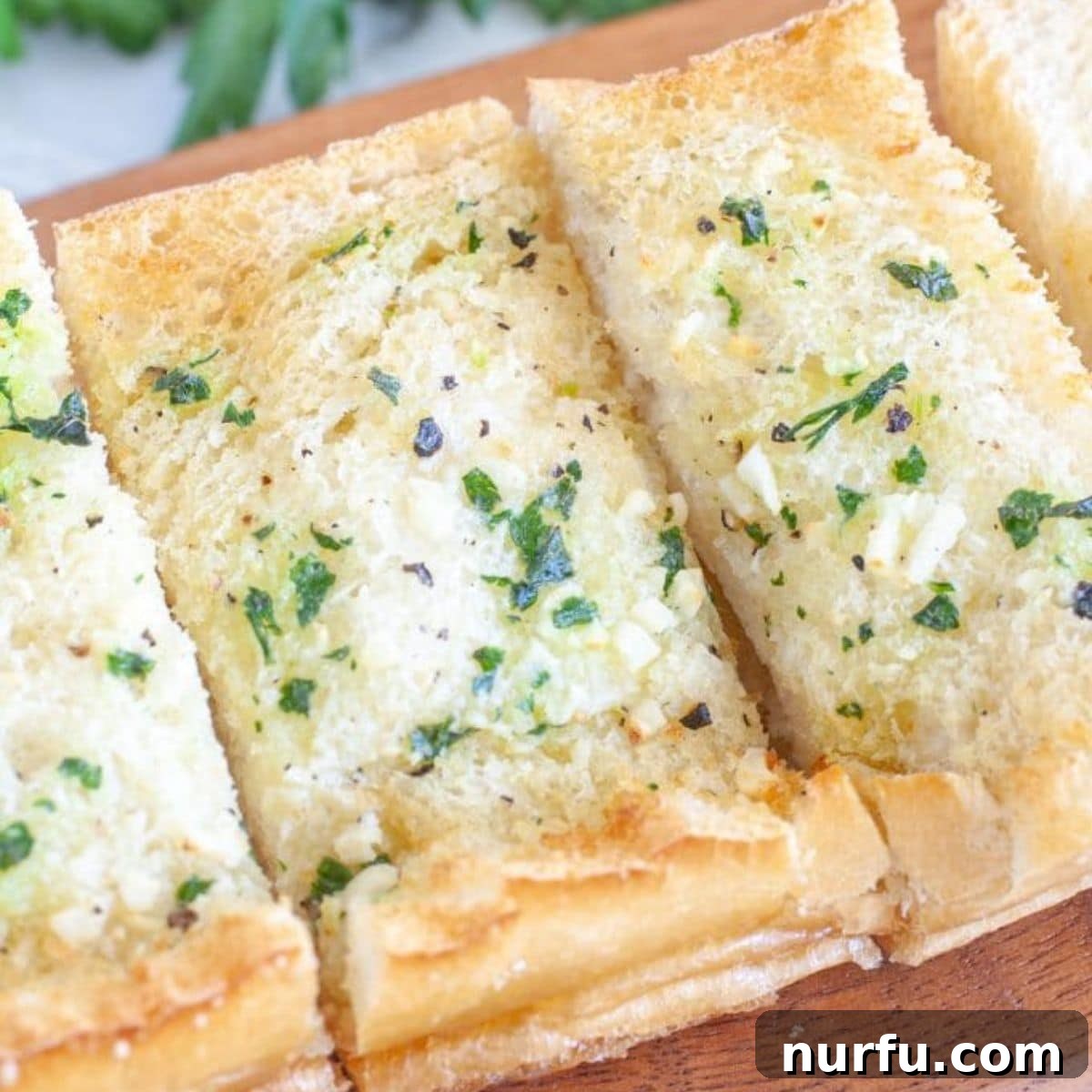 Perfect Air-Fried Garlic Bread 2 Garlic bread on a plate.
