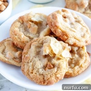 Chip cookies on a plate, ready to be enjoyed.
