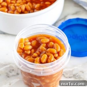 Container of baked beans.