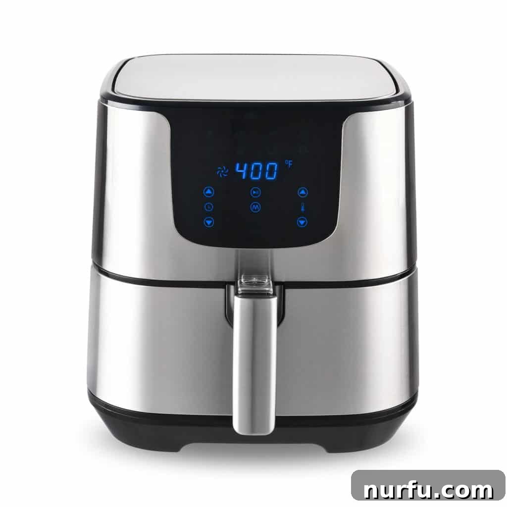 Your Guide To Optimal Air Fryer Oil 3 Selection of cooking oils on a wooden table