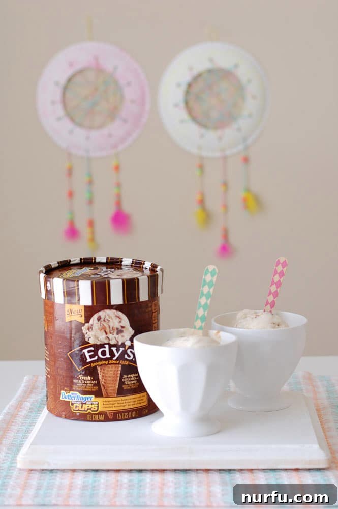 Two children's DIY dream catchers, adorned with colorful yarn, beads, and feathers, are proudly displayed, hanging against a soft background, suggesting a playful and creative summer party atmosphere. A symbol of handmade fun and sweet dreams for kids.