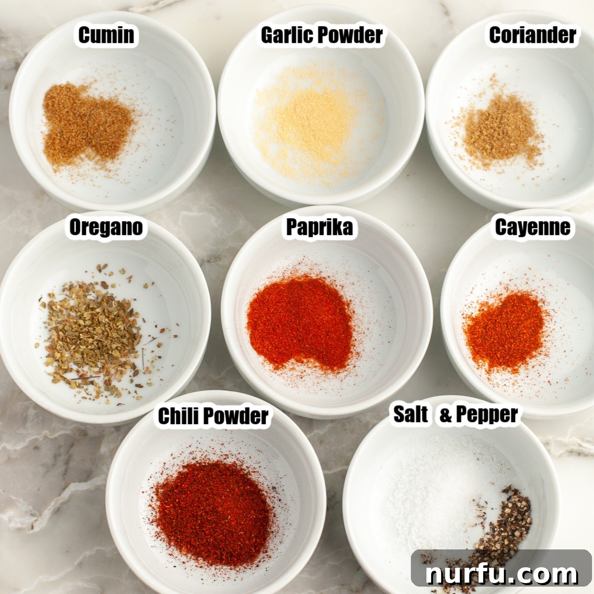 Unlock Irresistible Chicken Taco Flavor 3 Bowl of various spices, including chili powder, cumin, and paprika.