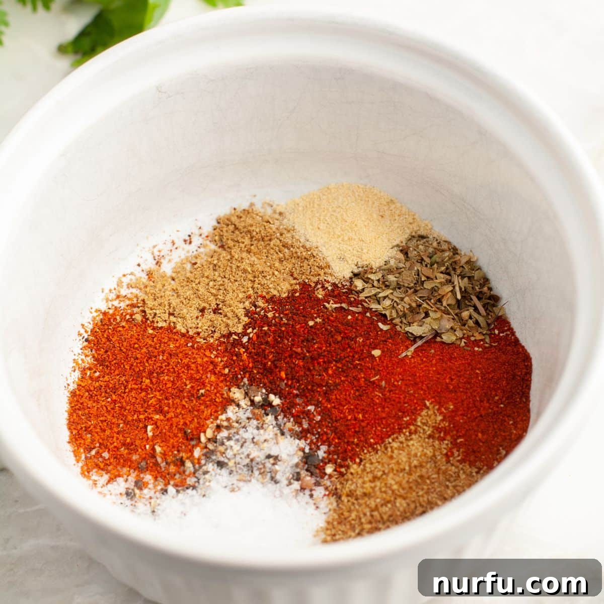 Unlock Irresistible Chicken Taco Flavor 4 Bowl of freshly mixed chicken taco seasoning.