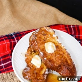 Golden brown air fryer French toast, ready to be served with syrup.