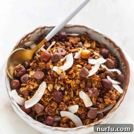 Crunchy air fryer chocolate and hazelnut high-protein granola, ready for a healthy breakfast.