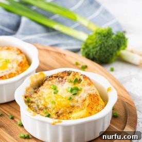 Fluffy egg cups cooked in a ramekin, showcasing their delicious ingredients.