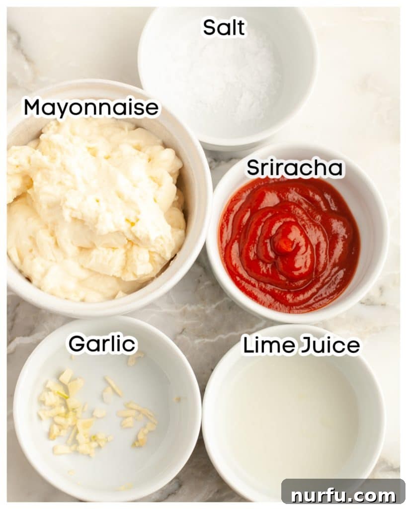 Fiery Sriracha Mayonnaise 3 Individual ingredients for Sriracha mayo laid out: mayonnaise, Sriracha sauce, lime juice, minced garlic, and salt.
