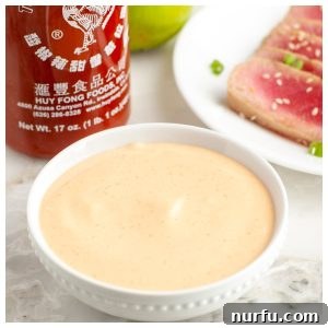 A beautiful, vibrant bowl of homemade Sriracha Mayo.