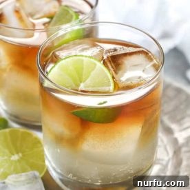 A Dark and Stormy cocktail, rich in color, served in a glass, ready for sipping.