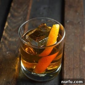 A classic Old Fashioned cocktail, expertly crafted and ready to be enjoyed.