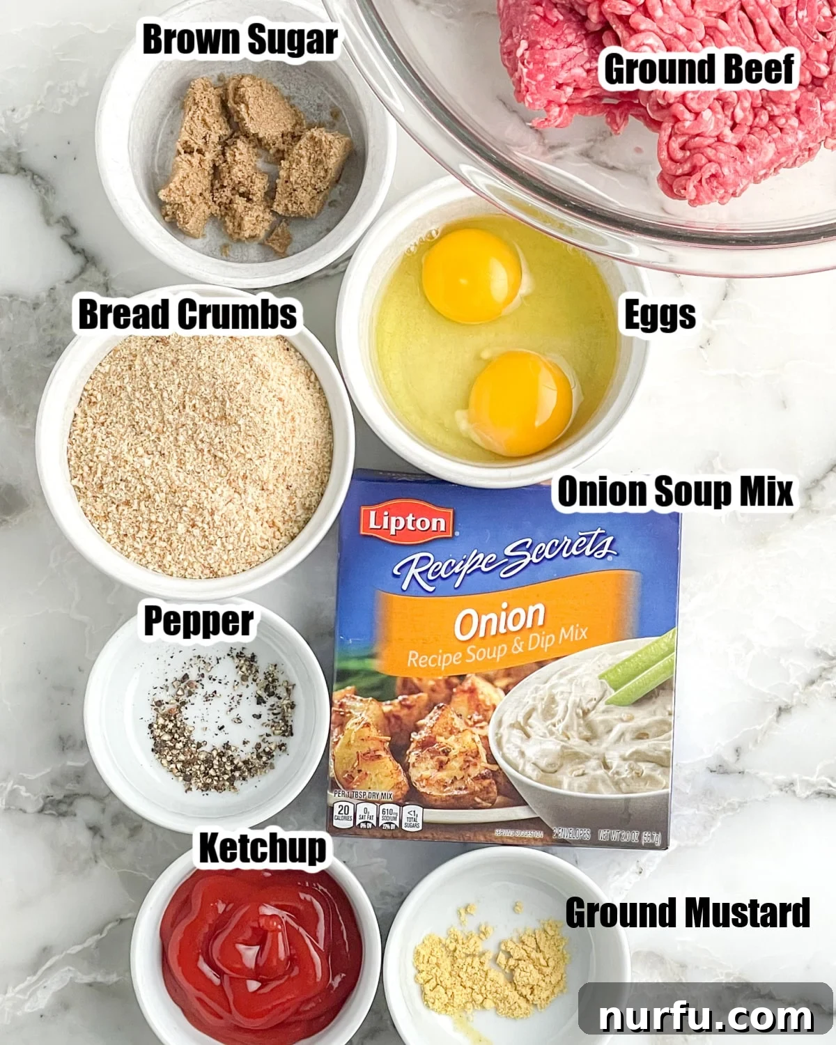 Savory Lipton Onion Soup Meatloaf 3 A vibrant spread of Lipton Onion Soup Meatloaf ingredients: fresh ground beef, bowls of golden breadcrumbs, whole eggs, rich brown sugar, and the essential Lipton onion soup mix, ready for mixing.